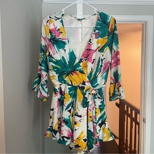 Quarterlength sleeve romper with ruffled legs